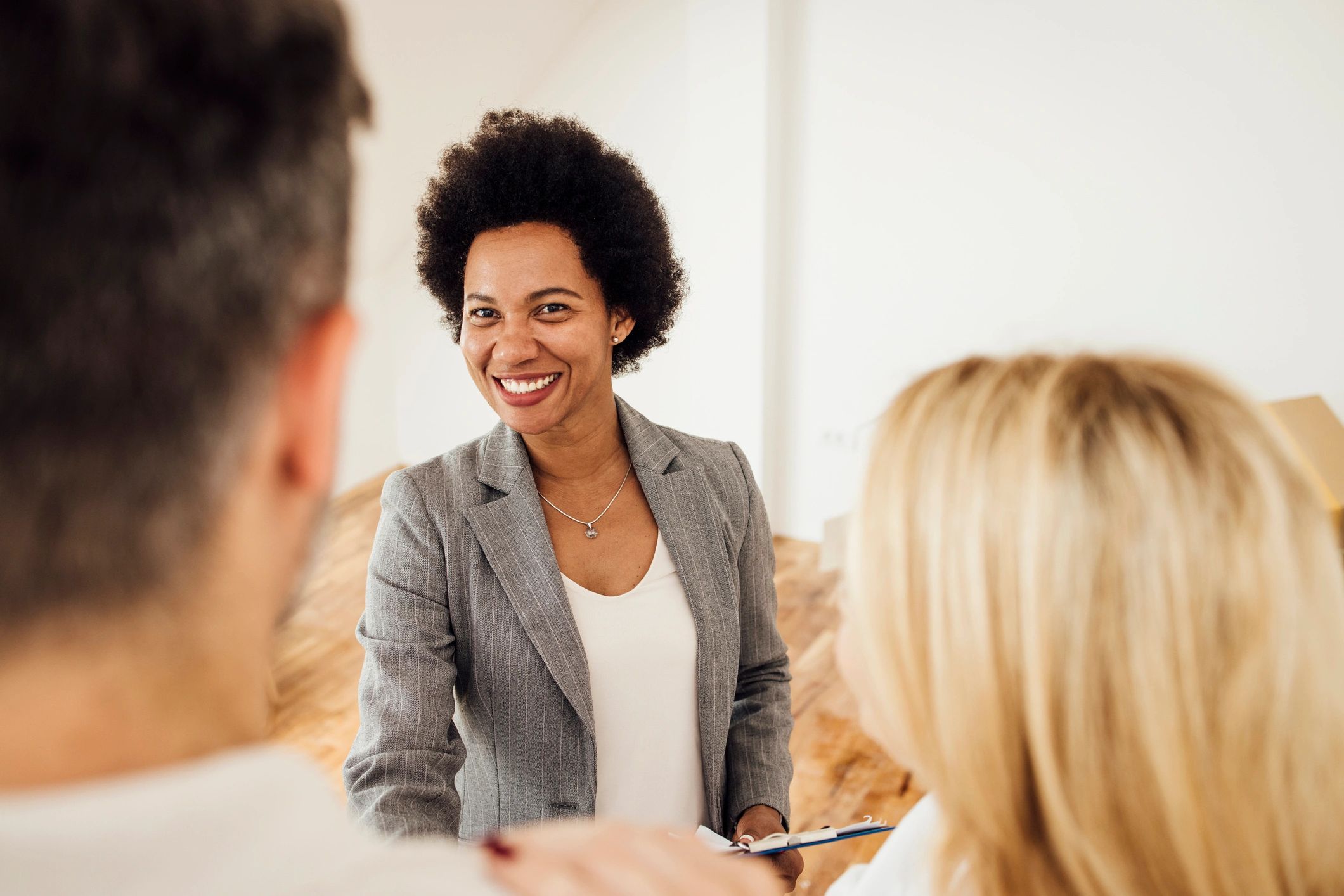 real estate agent working with clients