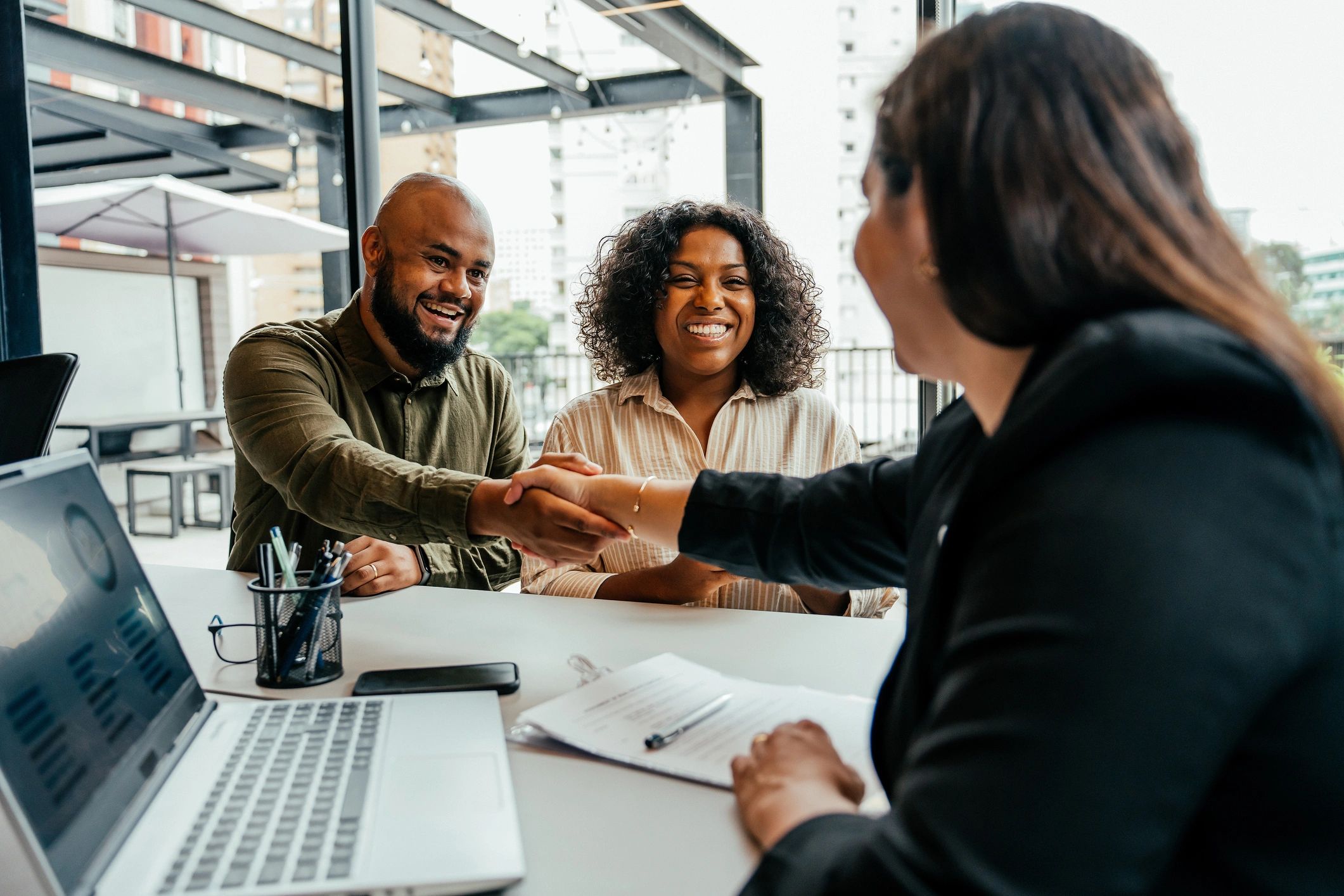 happy diverse clients homeowners real estate